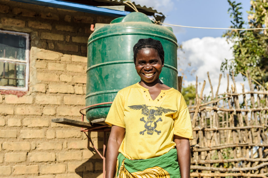 Giving-Sylvia re latrine Uganda